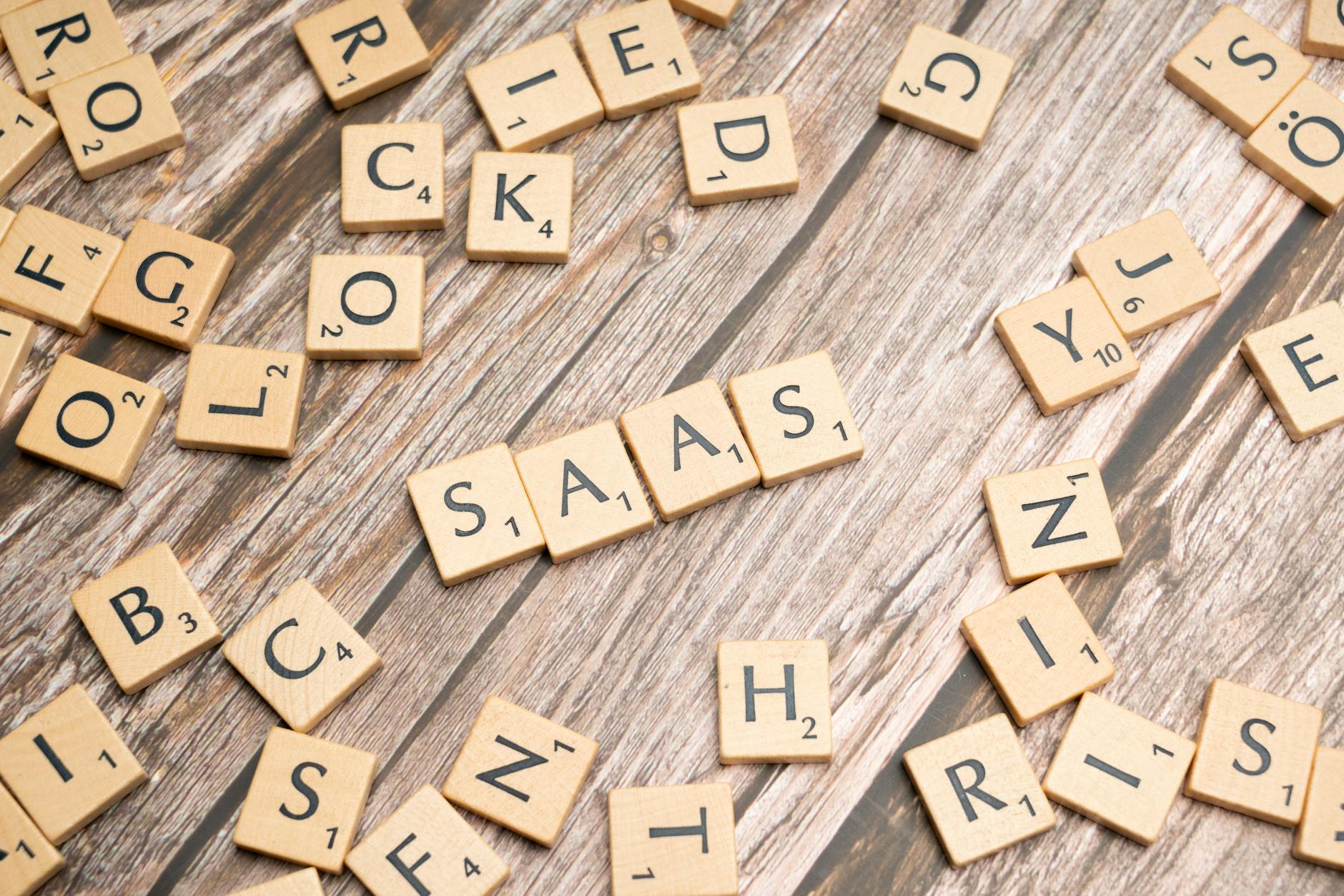 https://www.pexels.com/photo/scrabble-letters-spelling-saas-on-a-wooden-table-19867468/